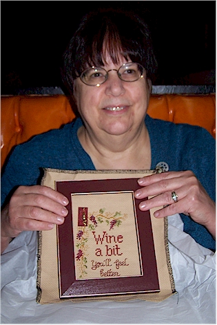 Carol with her wine stitch