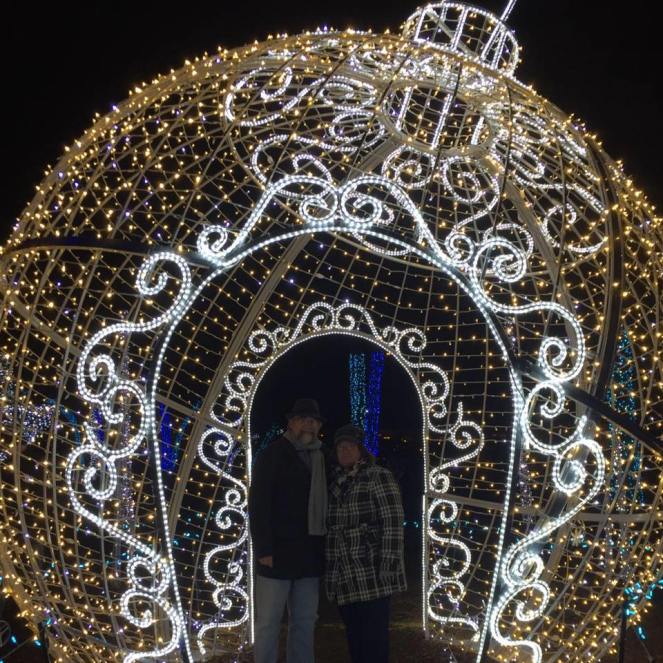 Us in a lighted Christmas ornament